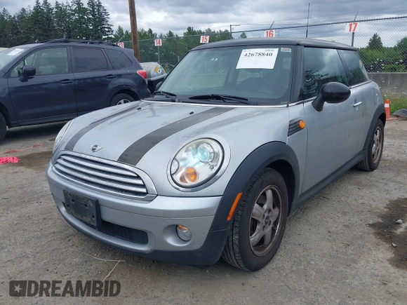 2007 MINI Hardtop with VIN WMWMF33557TU61953, listed as a IAAI auction lot 42678840 with 139,665 mi miles and . Bid and sale history available at DreamBid. Image 6.