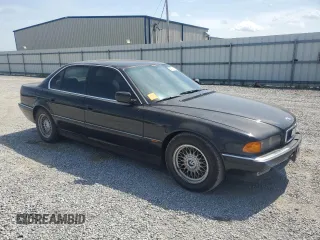 1995 BMW 7 Series 740i с VIN WBAGF6320SDH00710, выставлен на аукционе Copart как лот 54091515 с пробегом 205 085 миль миль и Чистый • Clean title. История ставок и продаж доступна на DreamBid. Изображение 4.