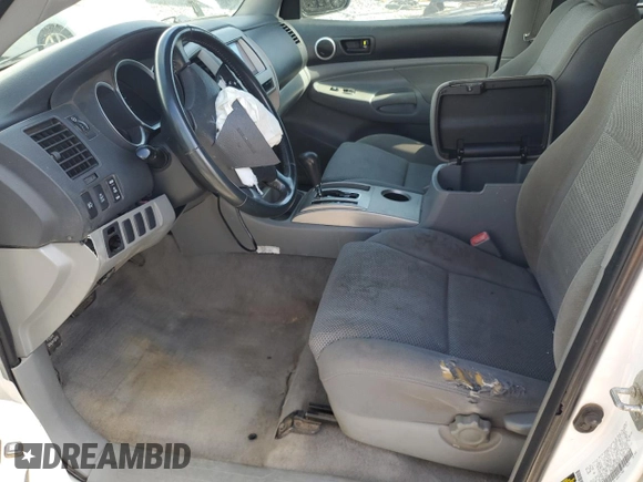 2007 Toyota Tacoma PreRunner with VIN 3TMJU62N57M047584, listed as a Copart auction lot 55884725 with 296,545 mi miles and Salvage title. Bid and sale history available at DreamBid. Image 7.
