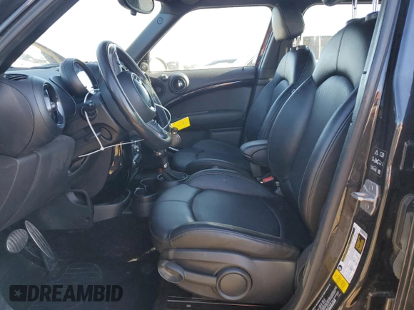 2016 MINI Countryman S with VIN WMWZC5C59GWU21416, listed as a Copart auction lot 57477455 with 119,868 mi miles and Salvage title. Bid and sale history available at DreamBid. Image 7.