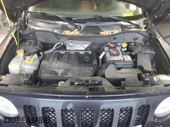 2015 Jeep Patriot Latitude with VIN 1C4NJRFB0FD125811, listed as a Copart auction lot 56658815 with 169,500 mi miles and Clean title. Bid and sale history available at DreamBid. Image 12.
