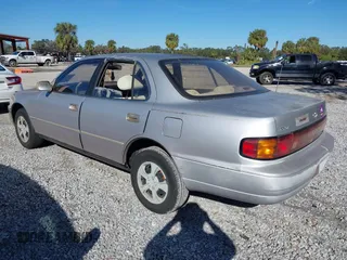 1994 Toyota Camry LE with VIN 4T1SK12E9RU351895, listed as a IAAI auction lot 41239573 with 184,866 mi miles. Bid and sale history available at carsss.com. Image 3.
