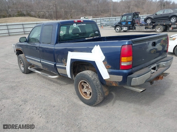 1999 Chevrolet Silverado 1500 LT with VIN 1GCEK19T3XE123498, listed as a IAAI auction lot 41801019 with 213,646 mi miles. Bid and sale history available at carsss.com. Image 3.