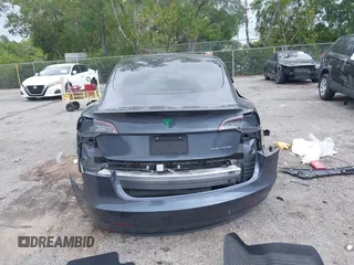 2021 Tesla Model 3 Long Range with VIN 5YJ3E1EBXMF836789, listed as a IAAI auction lot 41900027 with 71,086 mi miles. Bid and sale history available at carsss.com. Image 16.