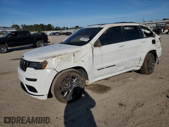 2018 Jeep Grand Cherokee High Altitude with VIN 1C4RJECG1JC125602, listed as a Copart auction lot 88702275 with 59,701 mi miles and Salvage title. Bid and sale history available at DreamBid. Image 1.