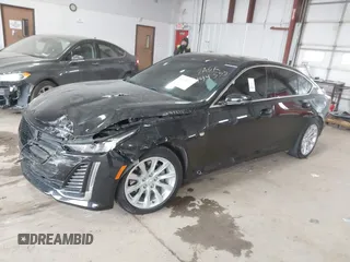 2021 Cadillac CT5 Luxury z VIN 1G6DX5RK0M0147667, wystawiony jako IAAI lot #41398726 z przebiegiem 50 387 mil mil oraz . Historia ofert i sprzedaży dostępna na DreamBid. Obrazek 17.