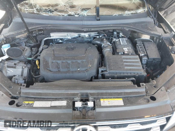 2021 Volkswagen Tiguan S with VIN 3VV0B7AX1MM098300, listed as a IAAI auction lot 42574636 with 53,559 mi miles and . Bid and sale history available at DreamBid. Image 10.