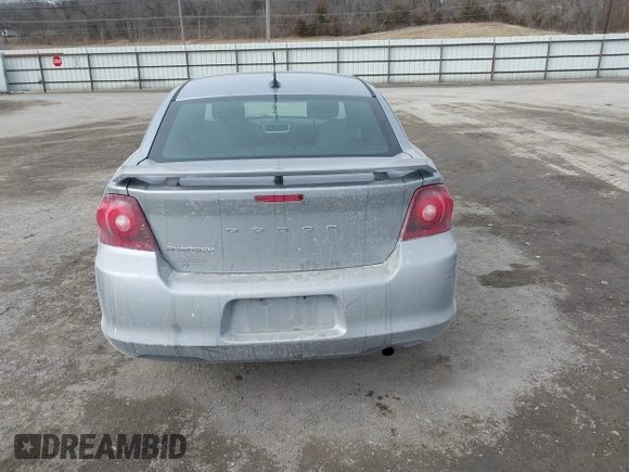 2014 Dodge Avenger SE with VIN 1C3CDZABXEN155014, listed as a IAAI auction lot 41554588 with 154,145 mi miles and . Bid and sale history available at DreamBid. Image 16.