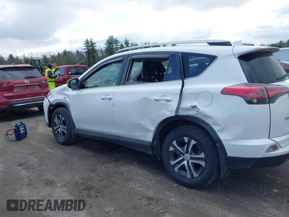 2018 Toyota RAV4 LE with VIN JTMBFREV5JJ738405, listed as a IAAI auction lot 41956145 with 100,593 mi miles and . Bid and sale history available at DreamBid. Image 12.