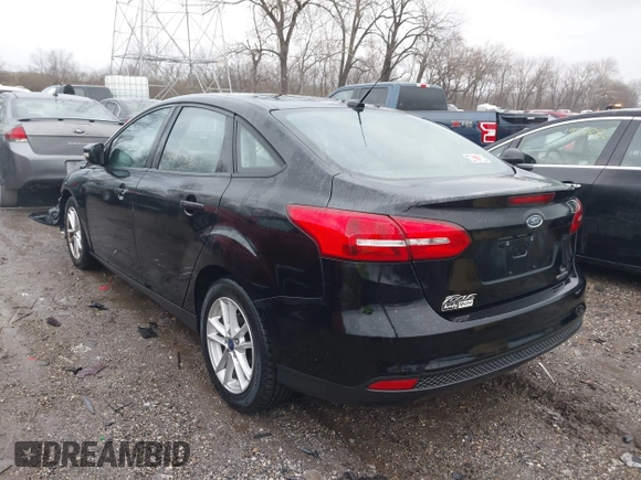 2016 Ford Focus SE z VIN 1FADP3F25GL386582, wystawiony jako IAAI lot #41097395 z przebiegiem 101 479 mil mil oraz . Historia ofert i sprzedaży dostępna na DreamBid. Obrazek 3.