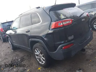 2016 Jeep Cherokee Latitude with VIN 1C4PJMCB0GW360103, listed as a IAAI auction lot 40788185 with 132,894 mi miles. Bid and sale history available at carsss.com. Image 3.