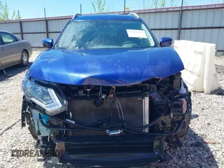 2019 Nissan Rogue SV with VIN 5N1AT2MT0KC705437, listed as a IAAI auction lot 42060597 with 98,555 mi miles and . Bid and sale history available at DreamBid. Image 13.