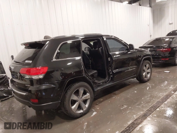 2014 Jeep Grand Cherokee Limited with VIN 1C4RJFBG4EC182065, listed as a IAAI auction lot 42291900 with 131,868 mi miles and . Bid and sale history available at DreamBid. Image 4.