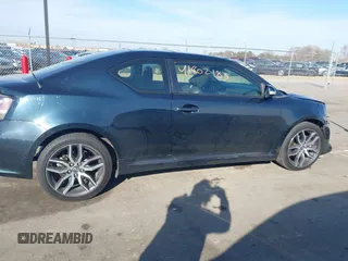 2015 Scion tC with VIN JTKJF5C71F3090963, listed as a IAAI auction lot 41802183 with 107,650 mi miles. Bid and sale history available at carsss.com. Image 13.
