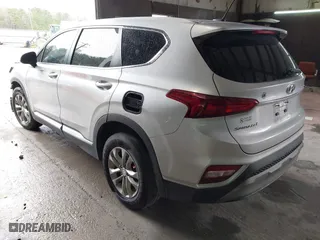 2019 Hyundai Santa Fe SE with VIN 5NMS23AD9KH035161, listed as a IAAI auction lot 41757044 with 124,835 mi miles. Bid and sale history available at carsss.com. Image 3.