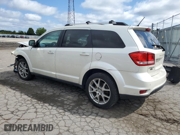 2013 Dodge Journey Crew with VIN 3C4PDCCG3DT643061, listed as a Copart auction lot 67518754 with 154,227 mi miles and Salvage title. Bid and sale history available at DreamBid. Image 2.