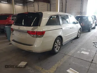 2014 Honda Odyssey EX-L with VIN 5FNRL5H60EB030841, listed as a IAAI auction lot 42271401 with 107,343 mi miles and . Bid and sale history available at DreamBid. Image 4.