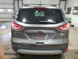 2013 Ford Escape SE with VIN 1FMCU9G96DUB33138, listed as a Copart auction lot 61851665 with 148,742 mi miles and Salvage title. Bid and sale history available at DreamBid. Image 6.