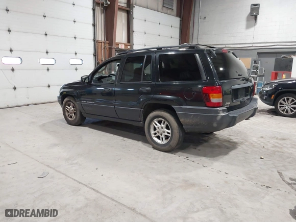 2003 Jeep Grand Cherokee Laredo with VIN 1J4GW48S63C552366, listed as a IAAI auction lot 41861501 with 227,464 mi miles. Bid and sale history available at carsss.com. Image 3.
