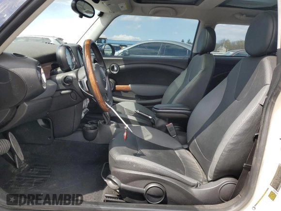 2008 MINI Hardtop with VIN WMWMF33528TT64260, listed as a Copart auction lot 52642935 with 82,502 mi miles and Salvage Title. Bid and sale history available at DreamBid. Image 7.