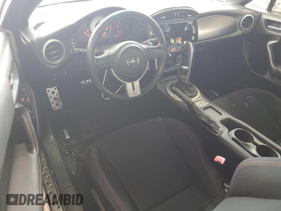 2013 Scion FR-S z VIN JF1ZNAA10D2724258, wystawiony jako Copart lot #60417725 z przebiegiem 138 315 mil mil oraz Czysty tytuł • Clean title. Historia ofert i sprzedaży dostępna na DreamBid. Obrazek 8.