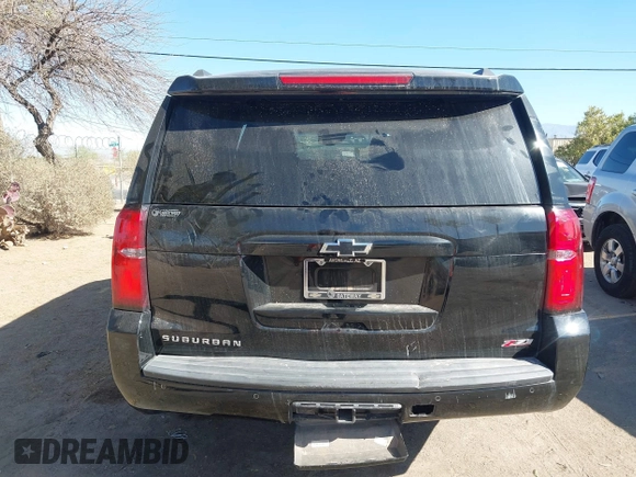 2020 Chevrolet Suburban LT with VIN 1GNSKHKC5LR303081, listed as a IAAI auction lot 41896511 with 60,121 mi miles and . Bid and sale history available at DreamBid. Image 15.
