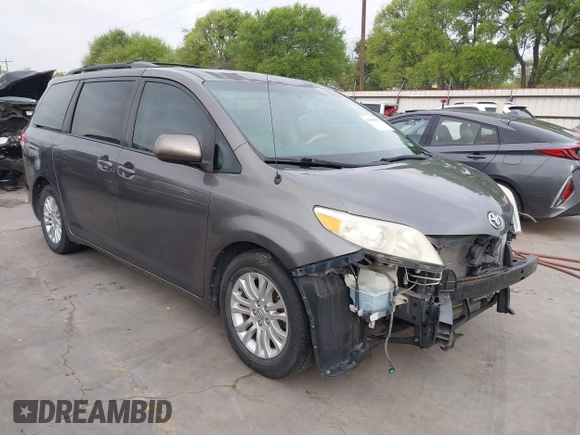 2011 Toyota Sienna XLE AAS with VIN 5TDYK3DC1BS136012, listed as a IAAI auction lot 41869637 with 231,418 mi miles. Bid and sale history available at carsss.com. Image 1.