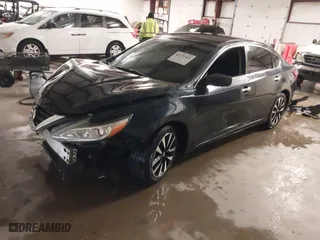 2018 Nissan Altima 2.5 SV with VIN 1N4AL3AP1JC276024, listed as a IAAI auction lot 41271383 with 121,088 mi miles. Bid and sale history available at carsss.com. Image 18.