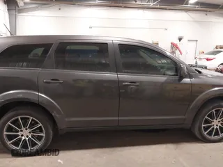2017 Dodge Journey GT z VIN 3C4PDDEG0HT623813, wystawiony jako IAAI lot #40992814 z przebiegiem 109 898 mil mil oraz . Historia ofert i sprzedaży dostępna na DreamBid. Obrazek 13.