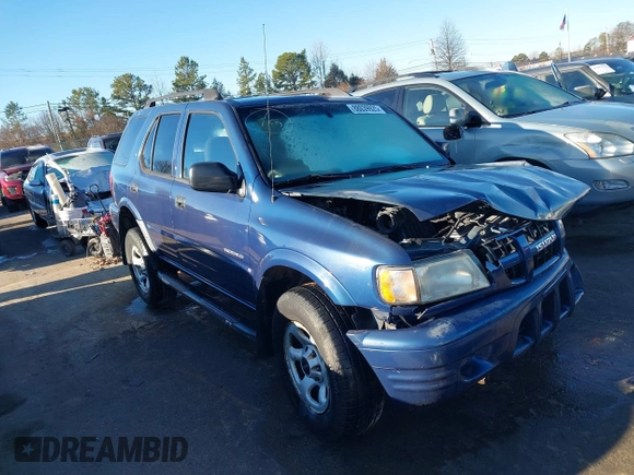 2004 Isuzu Rodeo S with VIN 4S2CK58W444314265, listed as a IAAI auction lot 41294636 with 291,080 mi miles and . Bid and sale history available at DreamBid. Image 1.