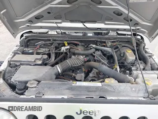 2011 Jeep Wrangler Sport with VIN 1J4AA2D18BL546069, listed as a IAAI auction lot 42139693 with 56,395 mi miles and . Bid and sale history available at carsss.com. Image 10.