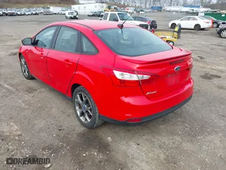 2013 Ford Focus SE with VIN 1FADP3F2XDL291995, listed as a IAAI auction lot 41949607 with 129,298 mi miles. Bid and sale history available at carsss.com. Image 3.