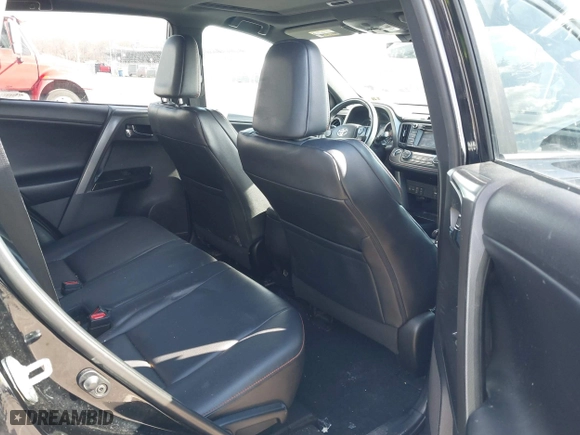 2018 Toyota RAV4 SE with VIN 2T3JFREVXJW817341, listed as a IAAI auction lot 41599972 with 99,739 mi miles. Bid and sale history available at carsss.com. Image 8.
