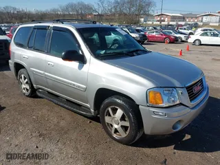 2004 GMC Envoy SLE with VIN 1GKDT13S042337388, listed as a IAAI auction lot 41756816 with 309,789 mi miles. Bid and sale history available at carsss.com. Image 1.