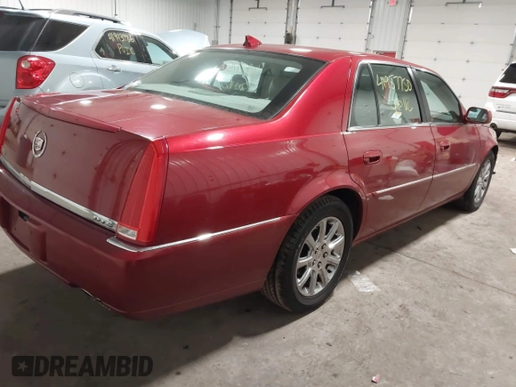 2009 Cadillac DTS w/1SA with VIN 1G6KD57Y59U149387, listed as a IAAI auction lot 41957750 with 94,939 mi miles. Bid and sale history available at carsss.com. Image 4.