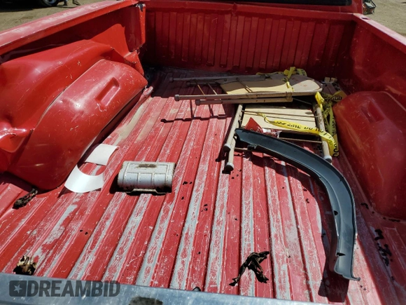 1996 Dodge Dakota z VIN 1B7GG23X1TS537628, wystawiony jako Copart lot #67980544 z przebiegiem 239 132 mil mil oraz Szkoda całkowita • Salvage title. Historia ofert i sprzedaży dostępna na DreamBid. Obrazek 10.