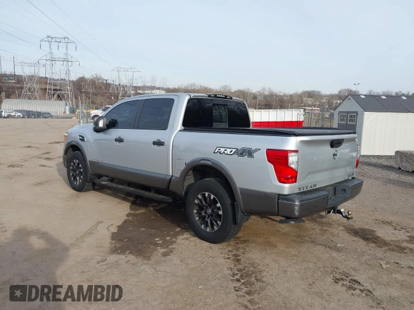 2017 Nissan Titan SL z VIN 1N6AA1E58HN506456, wystawiony jako IAAI lot #41521294 z przebiegiem 59 252 mil mil oraz . Historia ofert i sprzedaży dostępna na DreamBid. Obrazek 3.