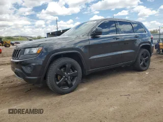 2015 Jeep Grand Cherokee Laredo with VIN 1C4RJFAG9FC742472, listed as a Copart auction lot 56281445 with 199,843 mi miles and Salvage title. Bid and sale history available at DreamBid. Image 1.