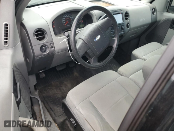 2007 Ford F-150 XL with VIN 1FTRF12207KD50317, listed as a Copart auction lot 58611805 with 122,940 mi miles and Salvage title. Bid and sale history available at DreamBid. Image 8.