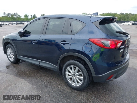 2016 Mazda CX-5 Sport with VIN JM3KE2BY0G0850298, listed as a IAAI auction lot 42107007 with 97,478 mi miles. Bid and sale history available at carsss.com. Image 3.
