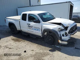 2022 Toyota Tacoma SR z VIN 3TYRZ5CN7NT021180, wystawiony jako Copart lot #52555875 z przebiegiem 66 535 mil mil oraz Nie do naprawy • Non repairable. Historia ofert i sprzedaży dostępna na DreamBid. Obrazek 4.