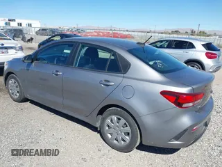 2023 Kia Rio S with VIN 3KPA24AD5PE524320, listed as a IAAI auction lot 41881897 with 48,615 mi miles. Bid and sale history available at carsss.com. Image 3.