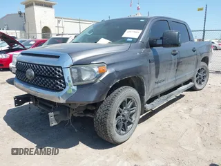 2018 Toyota Tundra SR5 z VIN 5TFEY5F10JX242131, wystawiony jako IAAI lot #41977889 z przebiegiem 178 913 mil mil oraz . Historia ofert i sprzedaży dostępna na DreamBid. Obrazek 2.