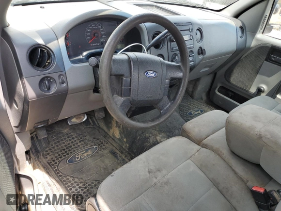 2007 Ford F-150 XL with VIN 1FTRF122X7NA00997, listed as a Copart auction lot 59664585 with 295,172 mi miles and Salvage title. Bid and sale history available at DreamBid. Image 8.