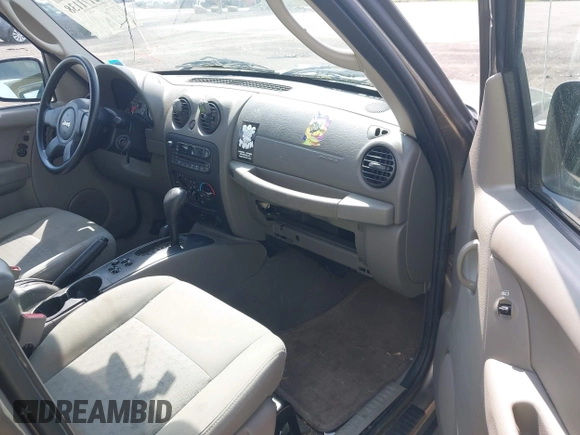 2005 Jeep Liberty Sport with VIN 1J4GL48K35W504401, listed as a IAAI auction lot 42171138 with 148,630 mi miles. Bid and sale history available at carsss.com. Image 5.