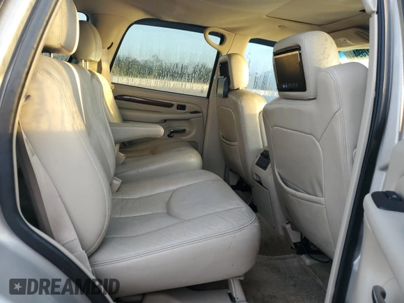 2004 Cadillac Escalade z VIN 1GYEC63T54R236225, wystawiony jako Copart lot #74075944 z przebiegiem 169 093 mil mil oraz Szkoda całkowita • Salvage title. Historia ofert i sprzedaży dostępna na DreamBid. Obrazek 11.