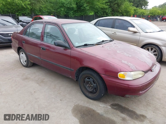 1998 Chevrolet Prizm Lsi z VIN 1Y1SK528XWZ423879, wystawiony jako IAAI lot #42522200 z przebiegiem 171 445 mil mil oraz . Historia ofert i sprzedaży dostępna na DreamBid. Obrazek 1.