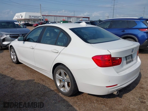 2015 BMW 3 Series 320i with VIN WBA3B1G5XFNT05903, listed as a IAAI auction lot 42063574 with Not Provided miles. Bid and sale history available at carsss.com. Image 3.