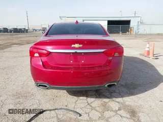 2014 Chevrolet Impala LTZ with VIN 1G1145SL0EU169876, listed as a IAAI auction lot 41696439 with 121,453 mi miles and . Bid and sale history available at DreamBid. Image 17.