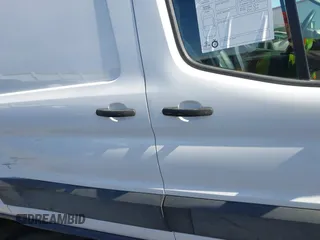 2023 Ford Transit Cargo with VIN 1FTBR2X84PKB37947, listed as a IAAI auction lot 41750849 with 58,114 mi miles and . Bid and sale history available at DreamBid. Image 13.